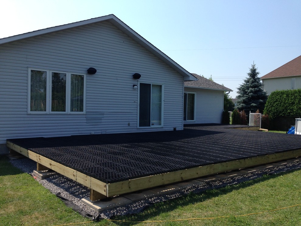 Inspiration for a huge transitional backyard deck remodel
