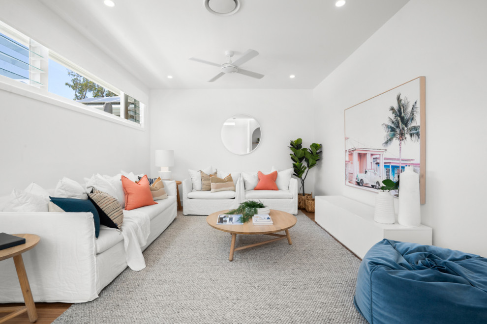 Inspiration for a coastal living room in Sunshine Coast.
