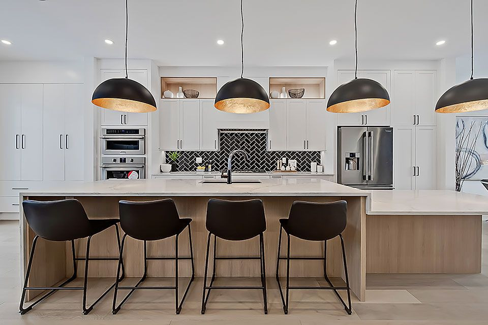 Example of a transitional home design design in Calgary