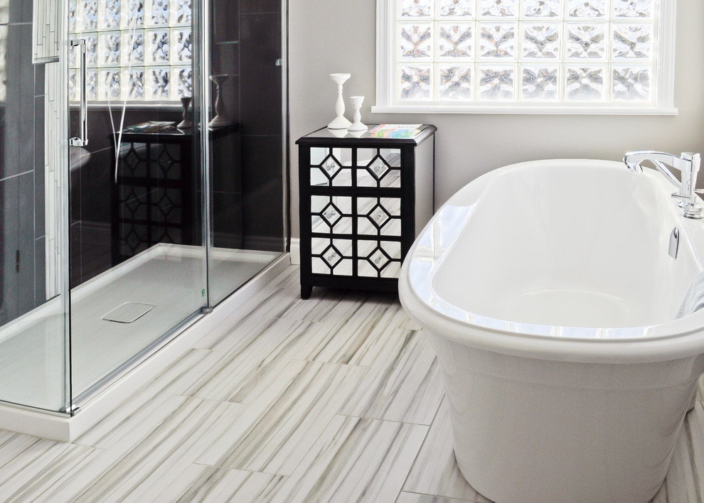 Large transitional master bathroom in Ottawa with a console sink, furniture-like cabinets, dark wood cabinets, solid surface benchtops, a freestanding tub, a corner shower, a two-piece toilet, multi-coloured tile, porcelain tile, grey walls and porcelain floors.