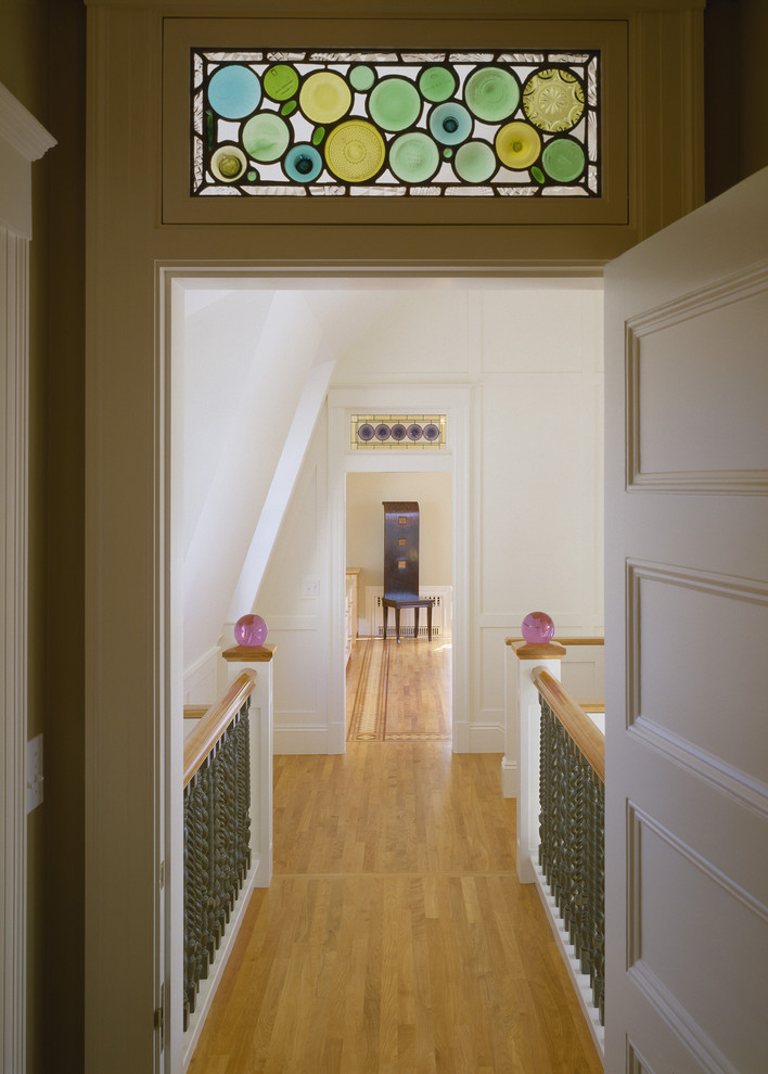 This is an example of a traditional hallway in Boston with white walls.