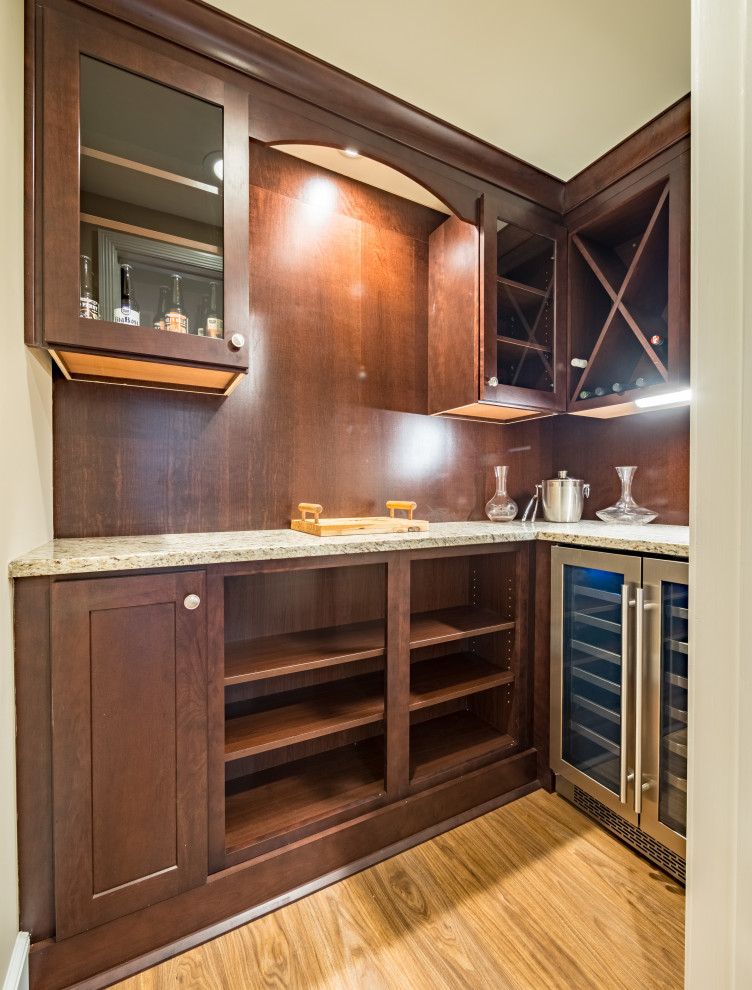 Example of a transitional home design design in Raleigh