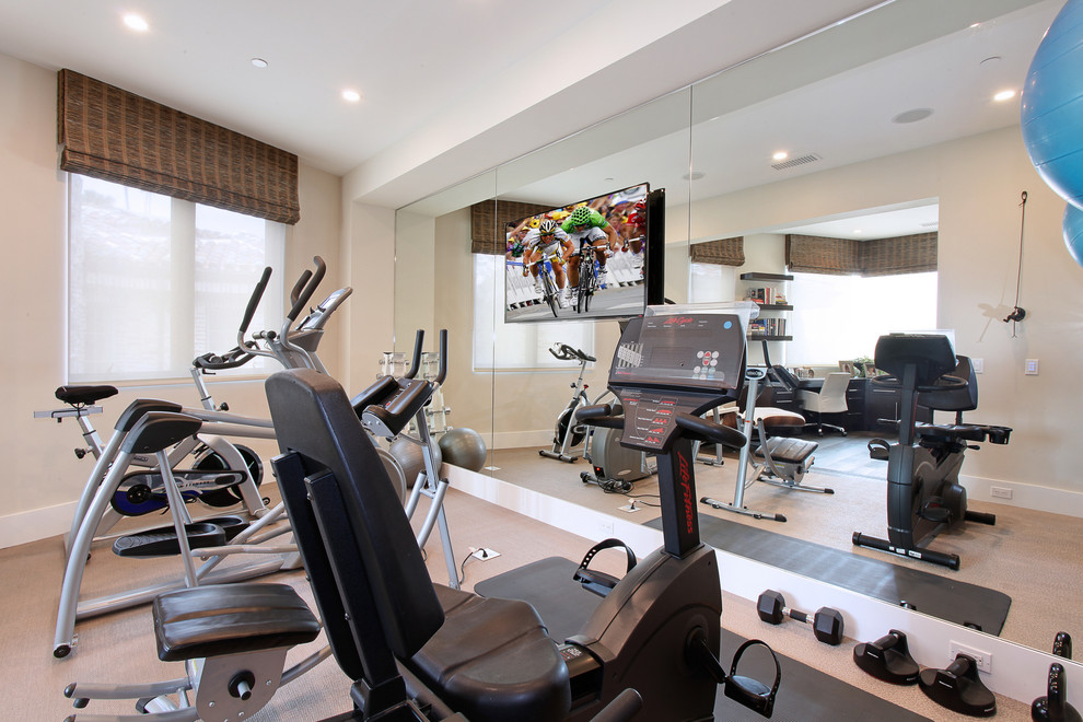 Inspiration for a contemporary multipurpose gym in Orange County with beige walls and beige floor.