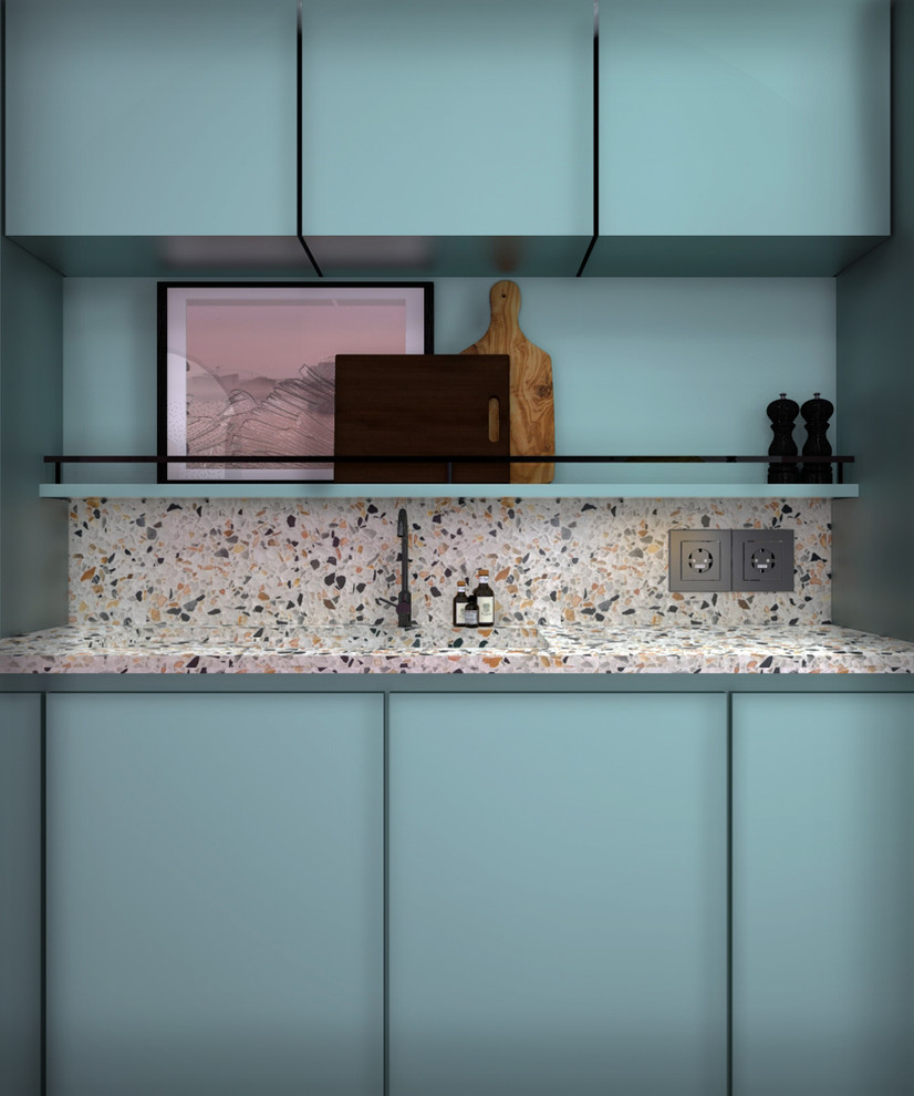Design ideas for a mid-sized midcentury single-wall open plan kitchen in Amsterdam with an integrated sink, beaded inset cabinets, blue cabinets, terrazzo benchtops, multi-coloured splashback, panelled appliances, concrete floors, grey floor and multi-coloured benchtop.