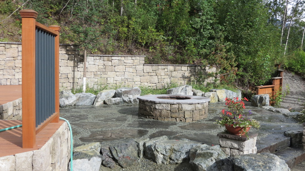 Example of a large mountain style home design design