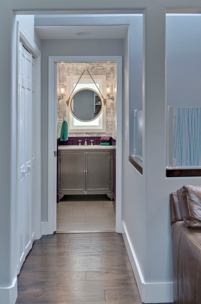 This is an example of a small transitional 3/4 bathroom in San Francisco with a drop-in sink, marble benchtops, a one-piece toilet and ceramic floors.