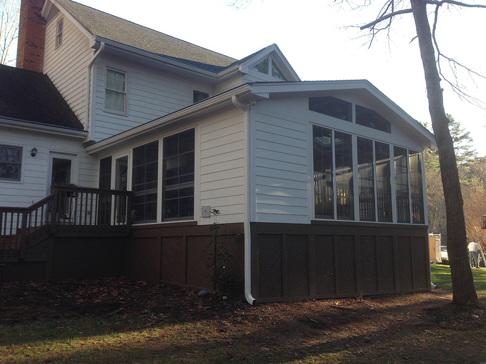 Example of a mid-sized transitional side yard deck design in Raleigh with no cover