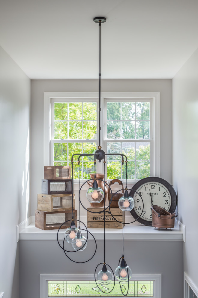 Inspiration for a huge transitional dark wood floor and brown floor foyer remodel in Columbus with gray walls and a brown front door