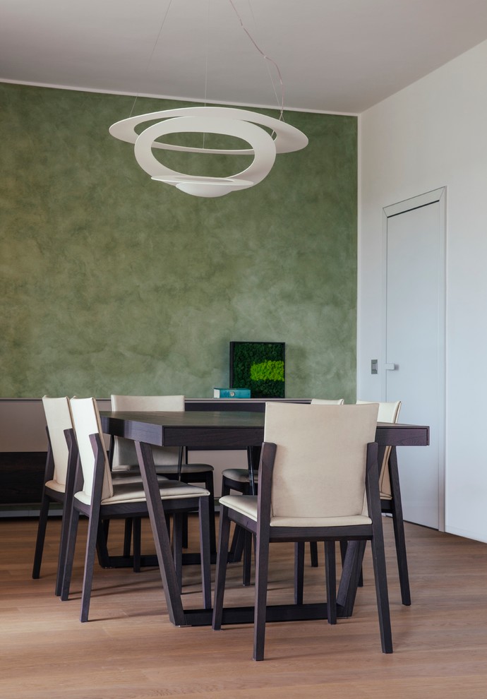 Photo of a modern dining room in Milan.