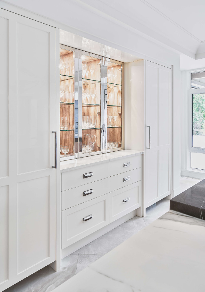 Eat-in kitchen - large contemporary l-shaped eat-in kitchen idea in Ottawa with two islands