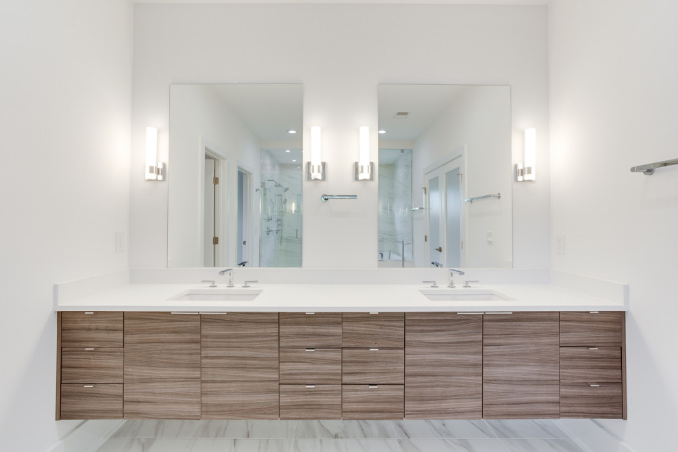 Example of a mid-sized transitional master marble floor and double-sink bathroom design in Other with white walls, an undermount sink, a hinged shower door and a built-in vanity