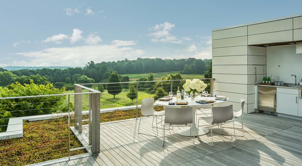 Design ideas for a contemporary rooftop and rooftop deck in Burlington with an outdoor kitchen and no cover.