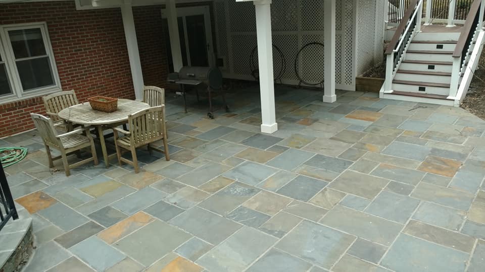 Example of a huge transitional backyard stone and kidney-shaped natural pool design