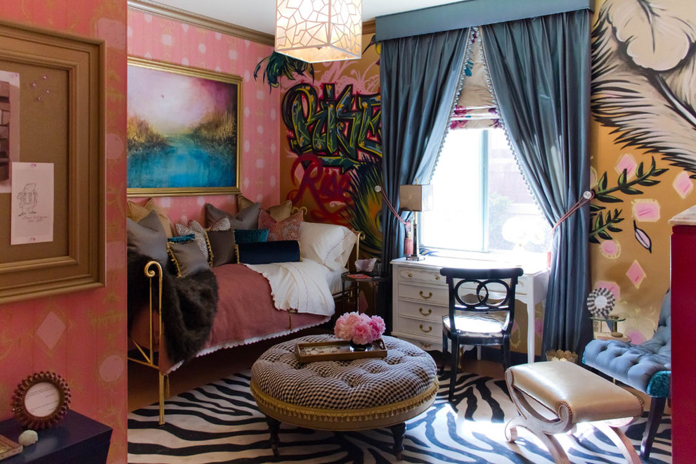 This is an example of an eclectic bedroom in Los Angeles with multi-coloured walls.