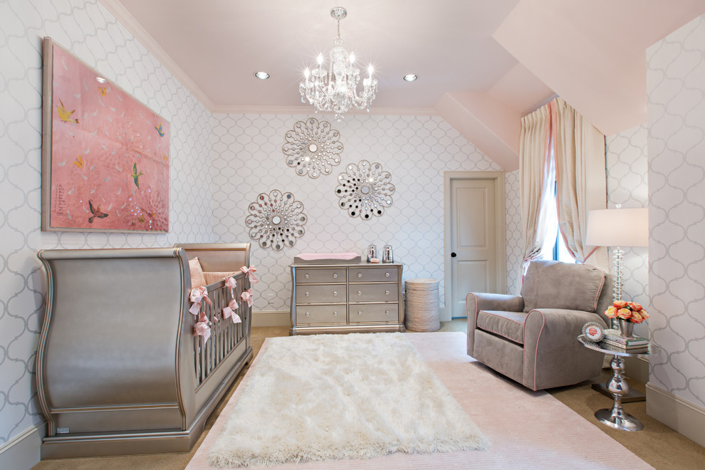 This is an example of a mid-sized transitional nursery for girls in Denver with white walls and carpet.