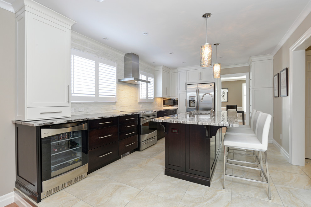Large transitional u-shaped ceramic tile enclosed kitchen photo in Toronto with an undermount sink, flat-panel cabinets, dark wood cabinets, granite countertops, beige backsplash, matchstick tile backsplash, stainless steel appliances and an island