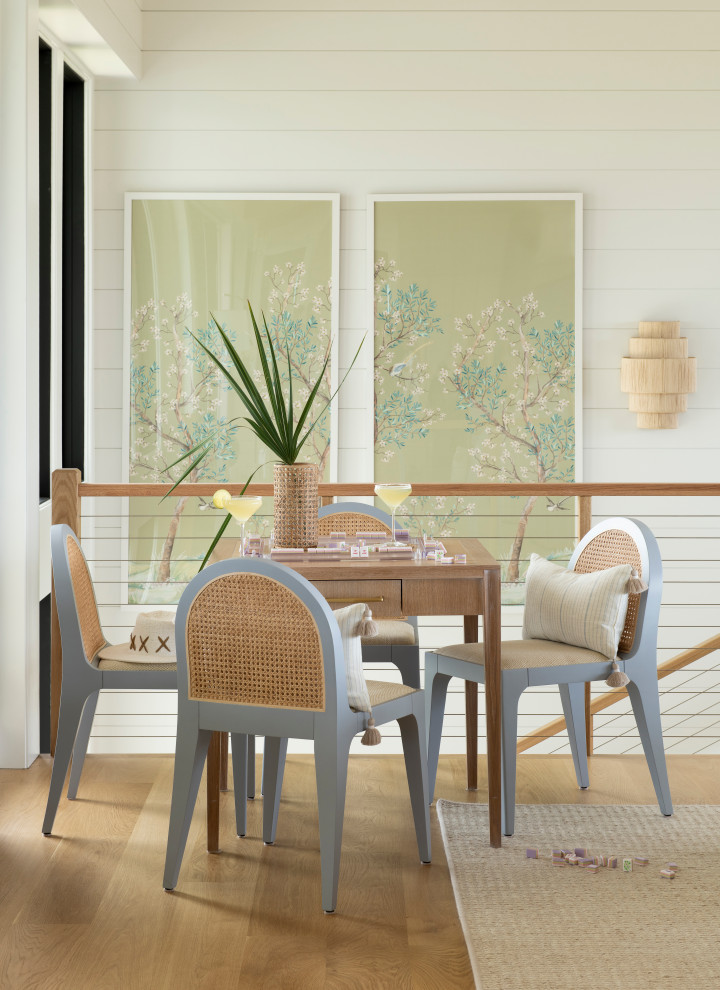 Example of a beach style home design design in Other