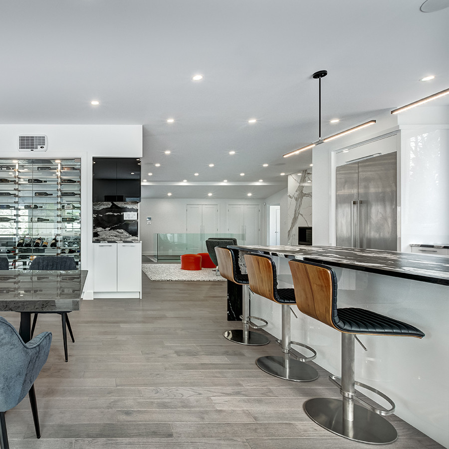 Inspiration for a contemporary kitchen in Toronto with an undermount sink, open cabinets, quartz benchtops, stainless steel appliances, medium hardwood floors, with island, grey floor and multi-coloured benchtop.