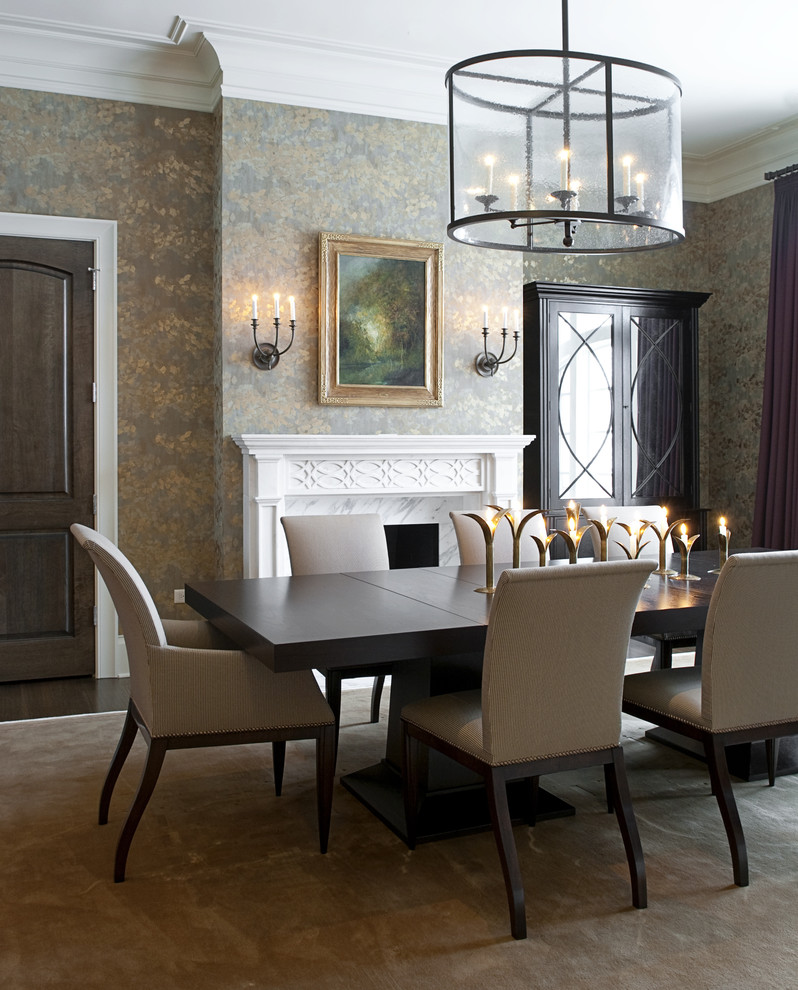 Design ideas for a contemporary dining room in Chicago with a standard fireplace.