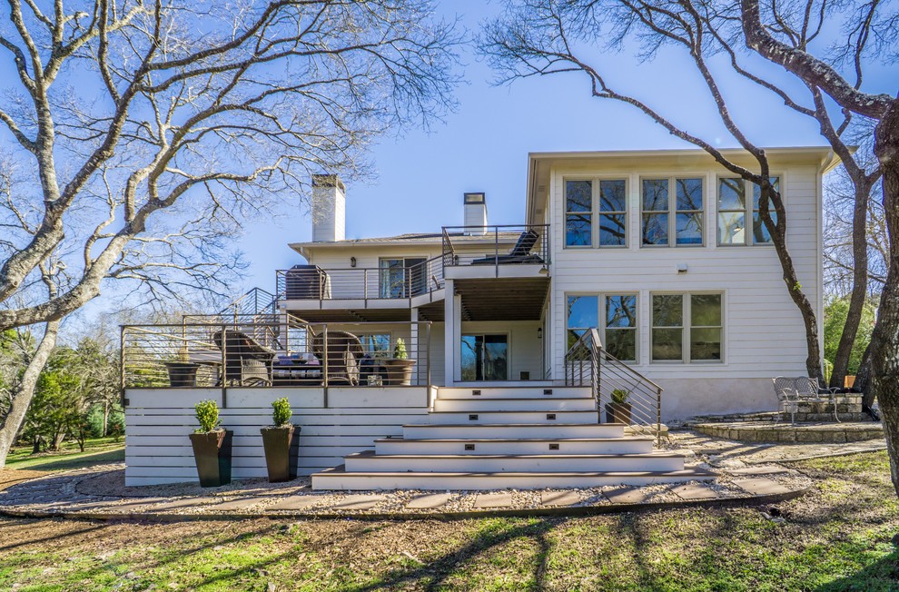 Inspiration for a large contemporary backyard deck remodel in Austin with no cover