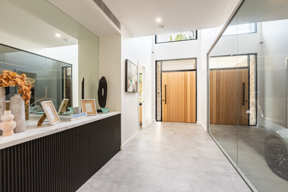 Photo of a contemporary entryway in Melbourne.