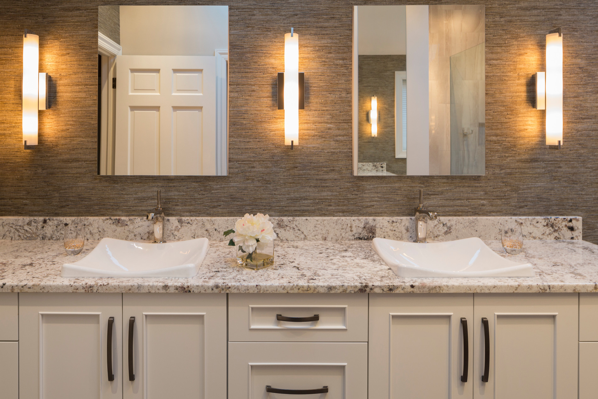 Large transitional master beige tile and ceramic tile porcelain tile and gray floor bathroom photo in Milwaukee with recessed-panel cabinets, white cabinets, a two-piece toilet, beige walls, a drop-in