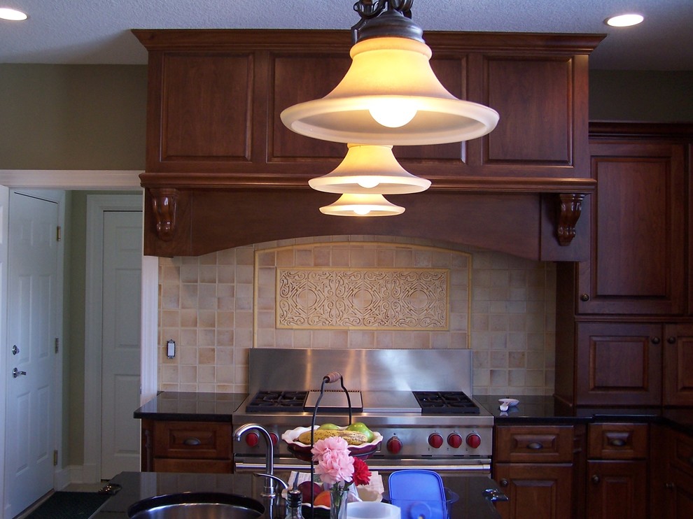 Open concept kitchen - traditional l-shaped open concept kitchen idea with granite countertops and ceramic backsplash