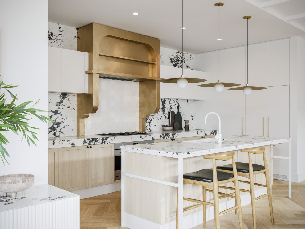 Mid-sized contemporary l-shaped open plan kitchen in Sunshine Coast with a double-bowl sink, shaker cabinets, light wood cabinets, quartz benchtops, white splashback, engineered quartz splashback, stainless steel appliances, light hardwood floors, with island and white benchtop.
