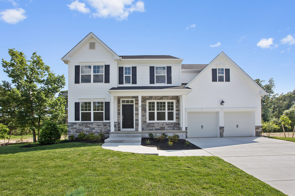 Example of a transitional white home design design in Philadelphia