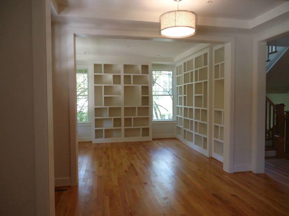 Inspiration for a mid-sized transitional light wood floor enclosed dining room remodel in Baltimore with beige walls