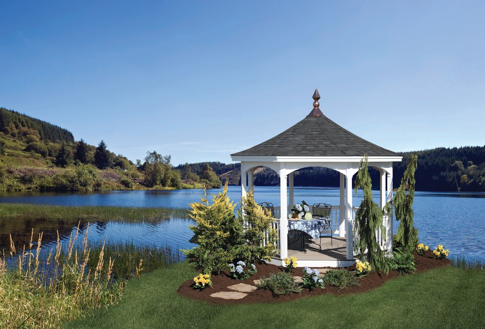 This is an example of a traditional patio in Other with a gazebo/cabana.
