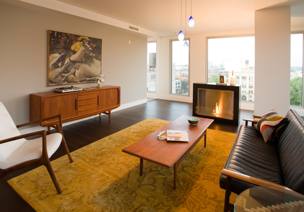 Large midcentury formal open concept living room in Portland with no tv, grey walls, dark hardwood floors, a standard fireplace, a tile fireplace surround and brown floor.