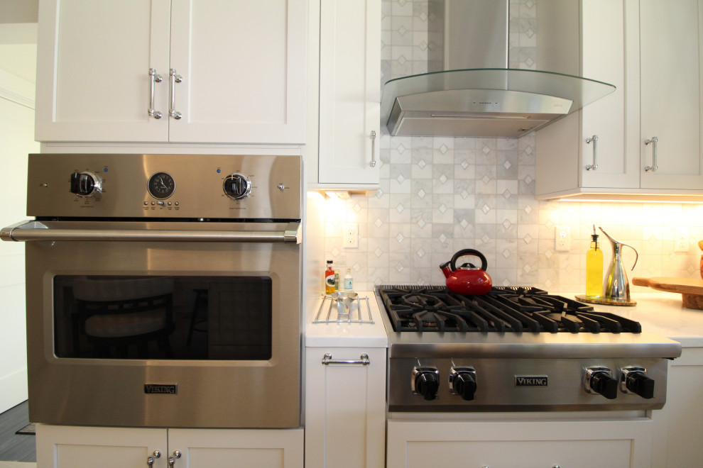 This is an example of a beach style kitchen in Boston.