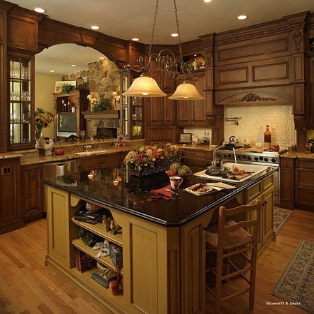 Design ideas for a large traditional u-shaped kitchen pantry in Oklahoma City with an undermount sink, raised-panel cabinets, distressed cabinets, granite benchtops, beige splashback, ceramic splashback, panelled appliances, light hardwood floors and with island.