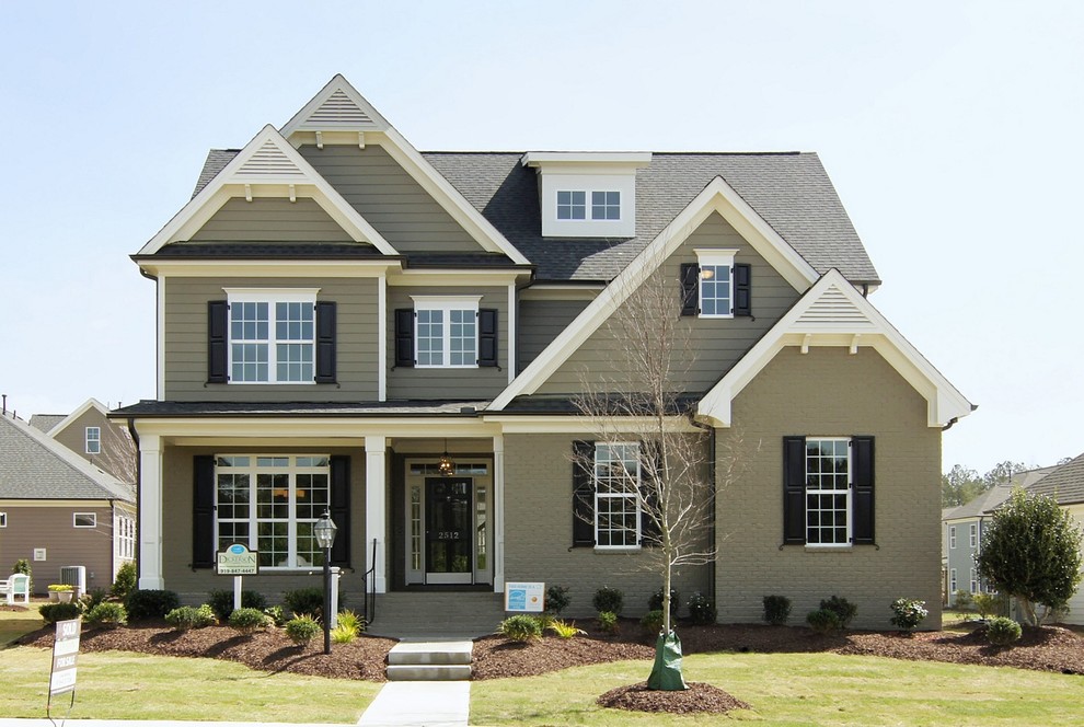 Example of a transitional exterior home design in Raleigh