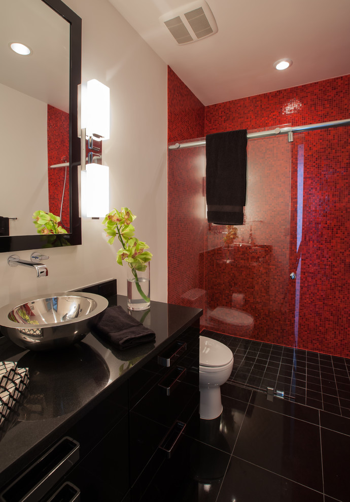 This is an example of a contemporary bathroom in Dallas with a vessel sink, flat-panel cabinets, black cabinets, granite benchtops, a curbless shower, red tile and mosaic tile.