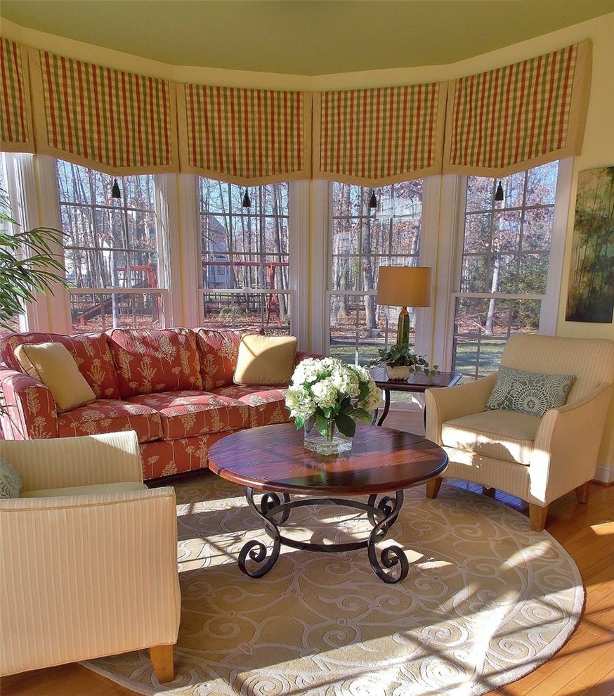 Design ideas for a transitional sunroom in DC Metro with medium hardwood floors and a standard ceiling.
