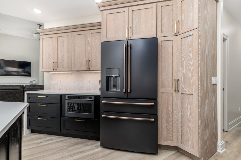 Sophisticated Storage with Textured Wood and Matte Black Appliances