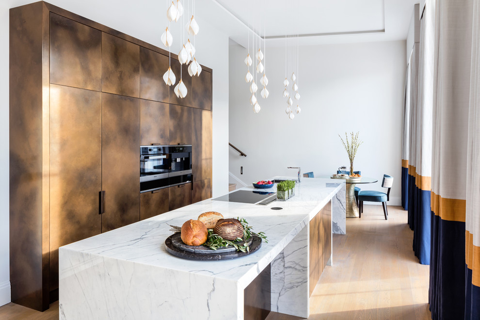 Design ideas for a contemporary galley kitchen in London with flat-panel cabinets, brown cabinets, medium hardwood flooring, an island and brown floors.