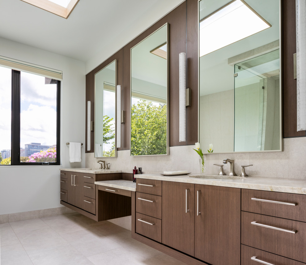 This is an example of a large transitional master bathroom in Seattle with flat-panel cabinets, medium wood cabinets, multi-coloured tile, white walls, ceramic floors, an undermount sink, granite benchtops, grey floor, multi-coloured benchtops, a niche, a double vanity, a floating vanity and wood walls.