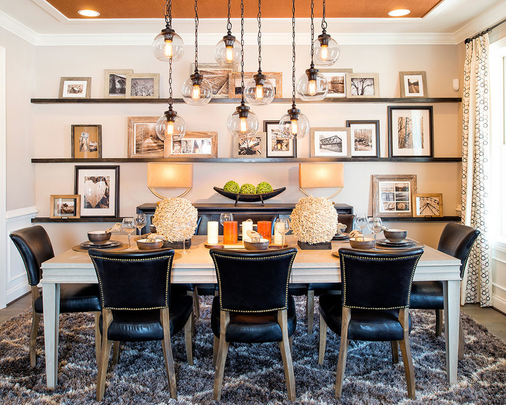 This is an example of an eclectic dining room in Toronto.