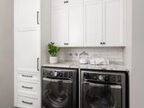 Transitional Laundry Room by Knight Custom Homes