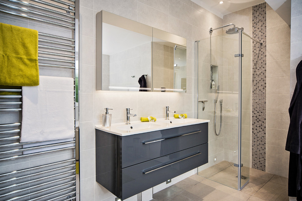 Contemporary master bathroom in Surrey with grey cabinets, a freestanding tub and an open shower.