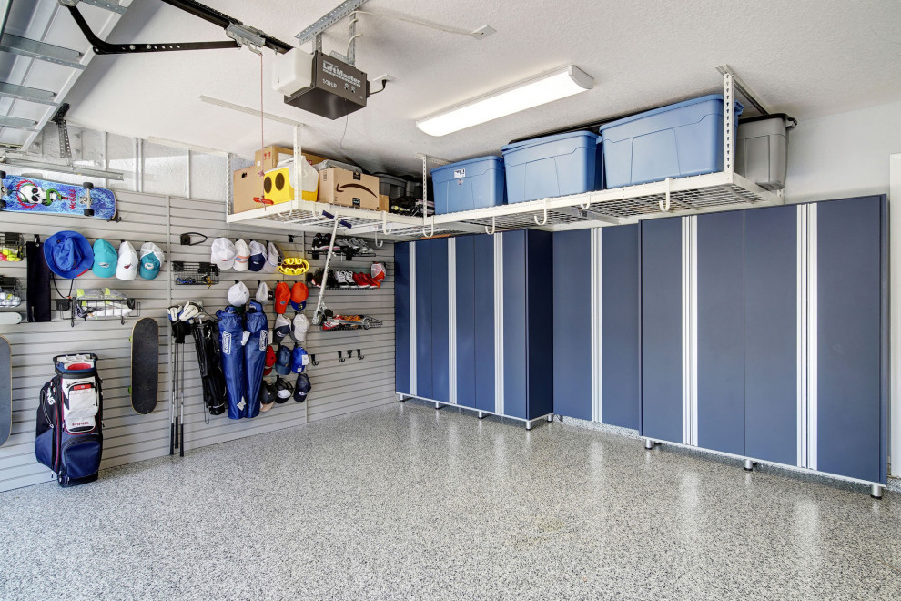 This is an example of a large contemporary attached three-car workshop in Miami.