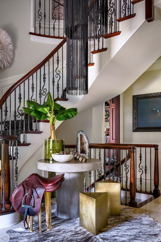 Example of a transitional ceramic tile and beige floor foyer design in Chicago with beige walls
