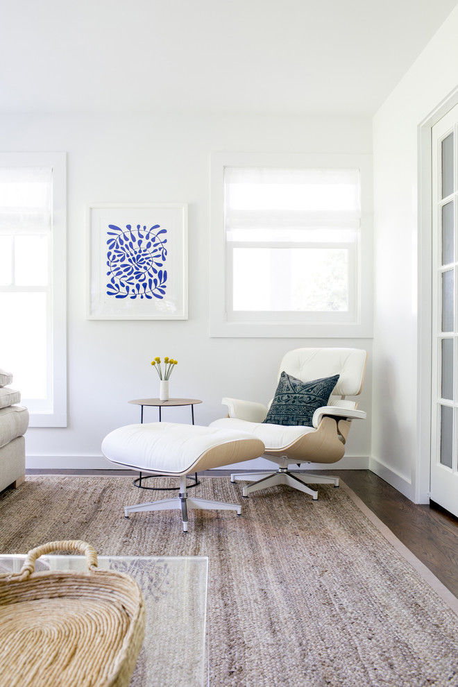 Photo of a large transitional open concept family room in New York with white walls.