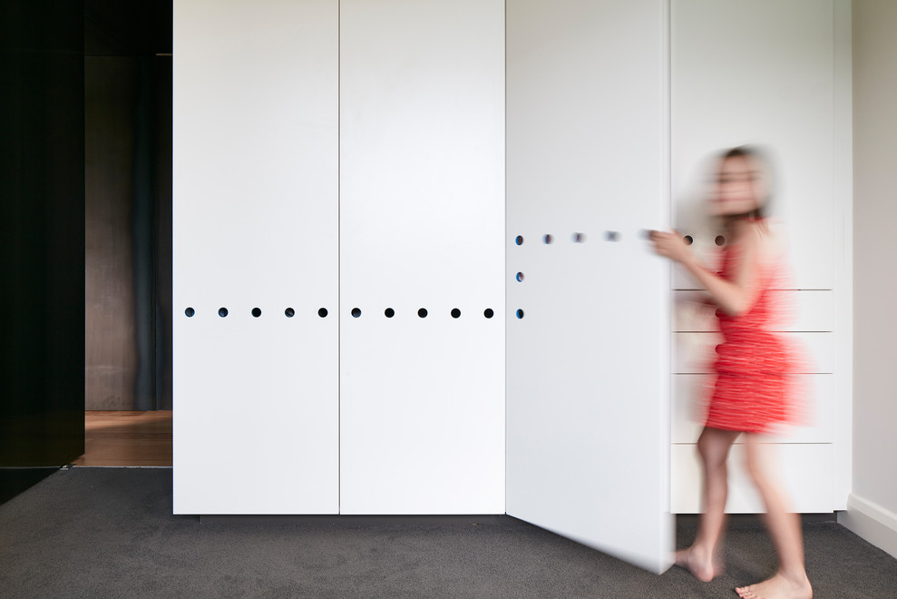 Design ideas for a mid-sized contemporary kids' bedroom for kids 4-10 years old and girls in Melbourne with white walls, carpet and grey floor.