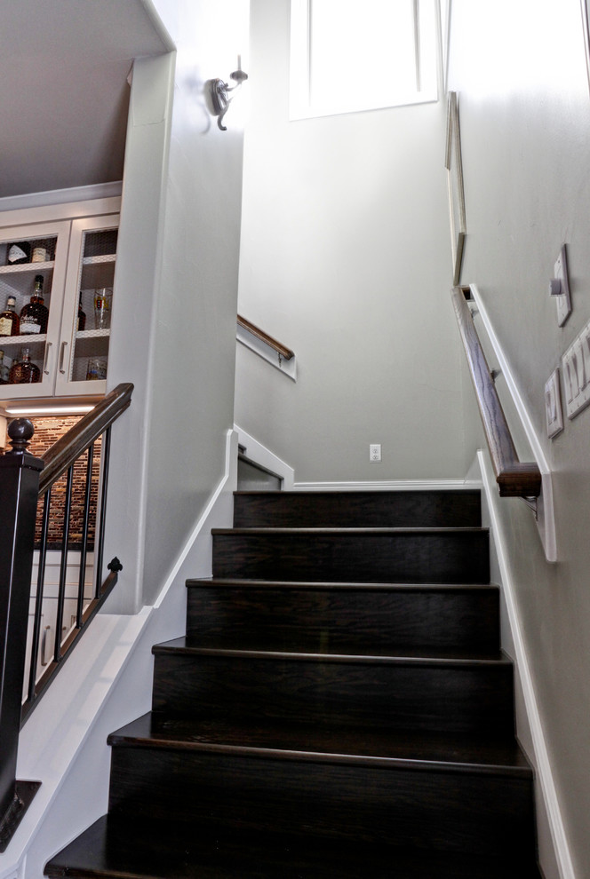 Inspiration for a small transitional wood l-shaped staircase in Austin with wood risers and wood railing.