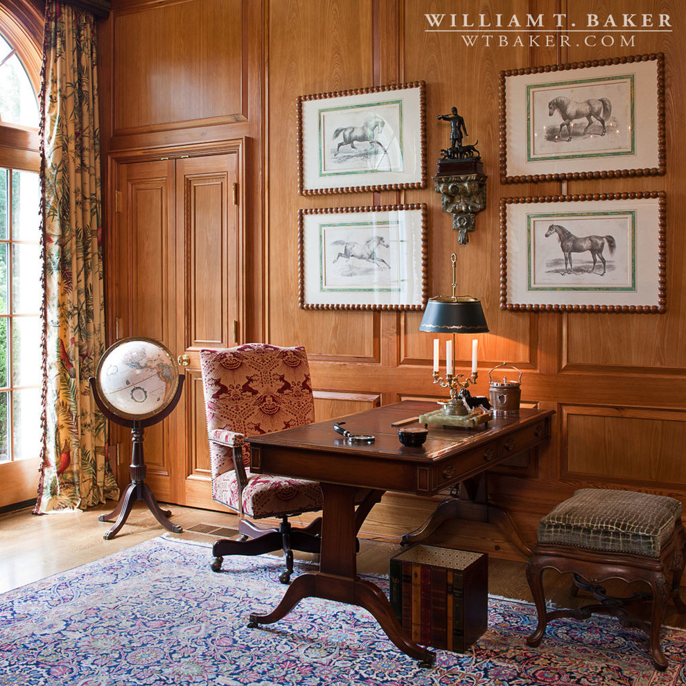 Photo of a large traditional study room in Atlanta with brown walls, medium hardwood floors and a freestanding desk.