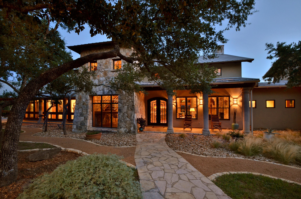 Rustic exterior home idea in Austin
